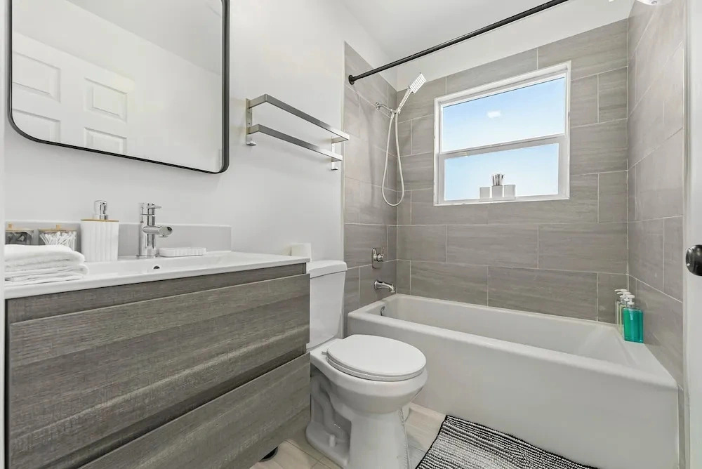 Spacious 8BR Home with AC & Parking