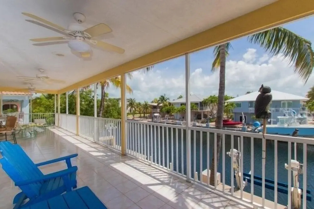 Beautiful House Located In The Prestigious Neighborhood Of Port Antigua On A Deep, Wide Canal. 4 Bedroom Home by RedAwning