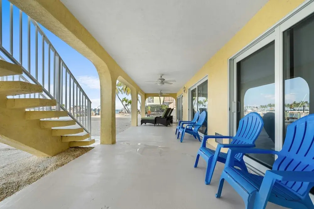 Sunset Harbor Waterfront Villa with Dock Cabana Club
