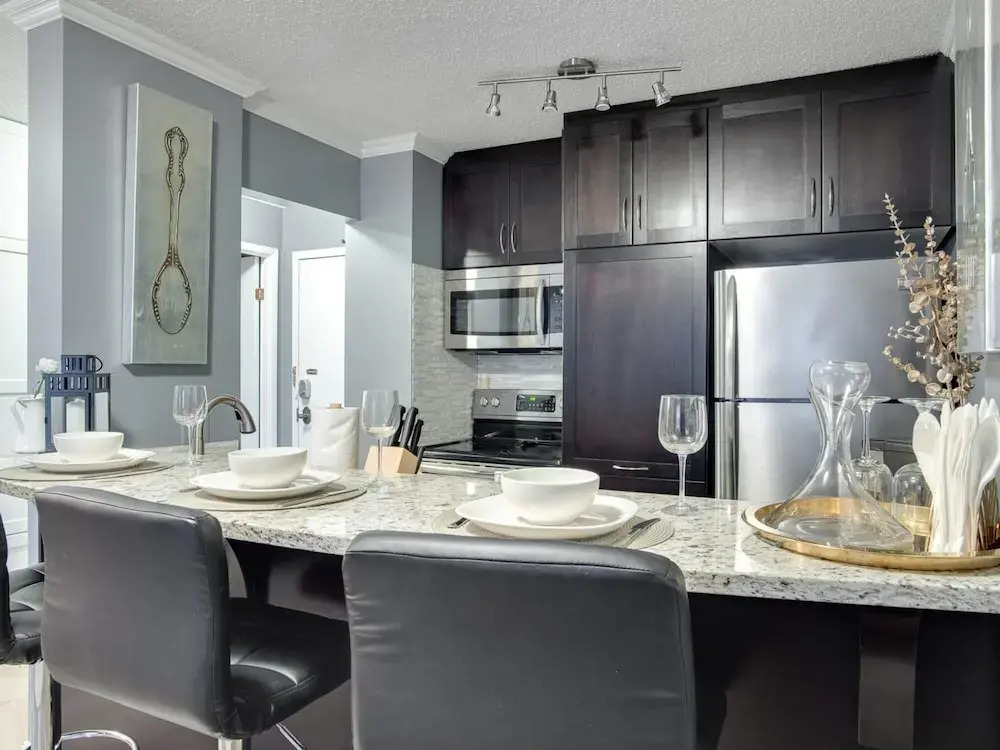 Cozy and Central DT Home w Gym Coffee Parking BBQ