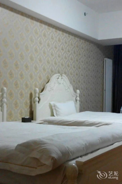 Cocoa Hotel (Zhengzhou Erqi Wanda City Second People's Hospital Metro Station)