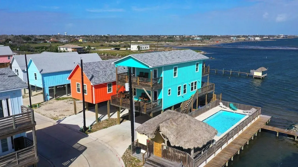 Sleeps 22 3 Homes on the Bay w/ Waterfront Pool + Boat Dock Laguna Village