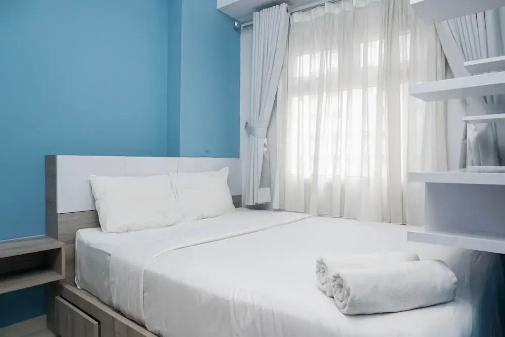 Relaxing and Warm 2BR @ Green Pramuka City Apartment