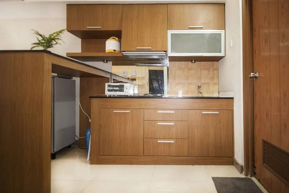 2BR Cozy at Empyreal Epicentrum Apartment By Travelio