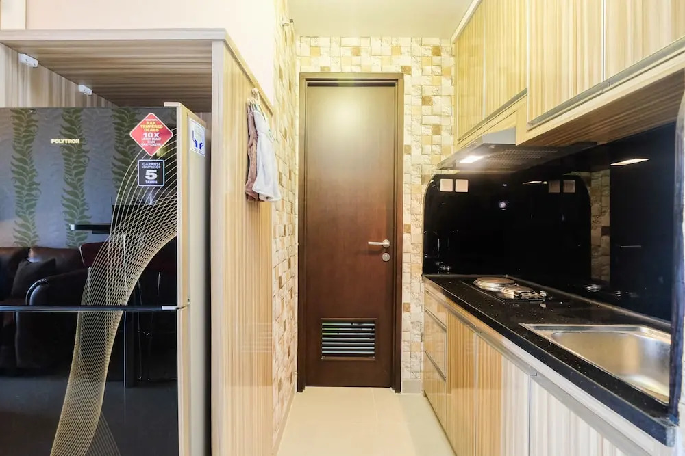 Cozy 1Br Apartment With Workspace At Mustika Golf Residence