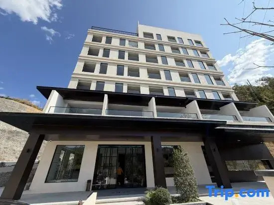 Jiuheyueyuan Wenquan Forest Resort Hotel