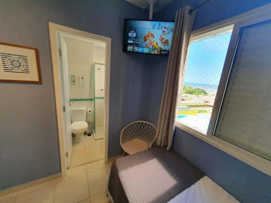 Home 1 Ap com Cinema em Resort Frente Mar Piscina Aquecida