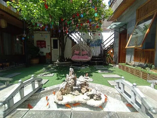 Quwanba Yuexi Inn