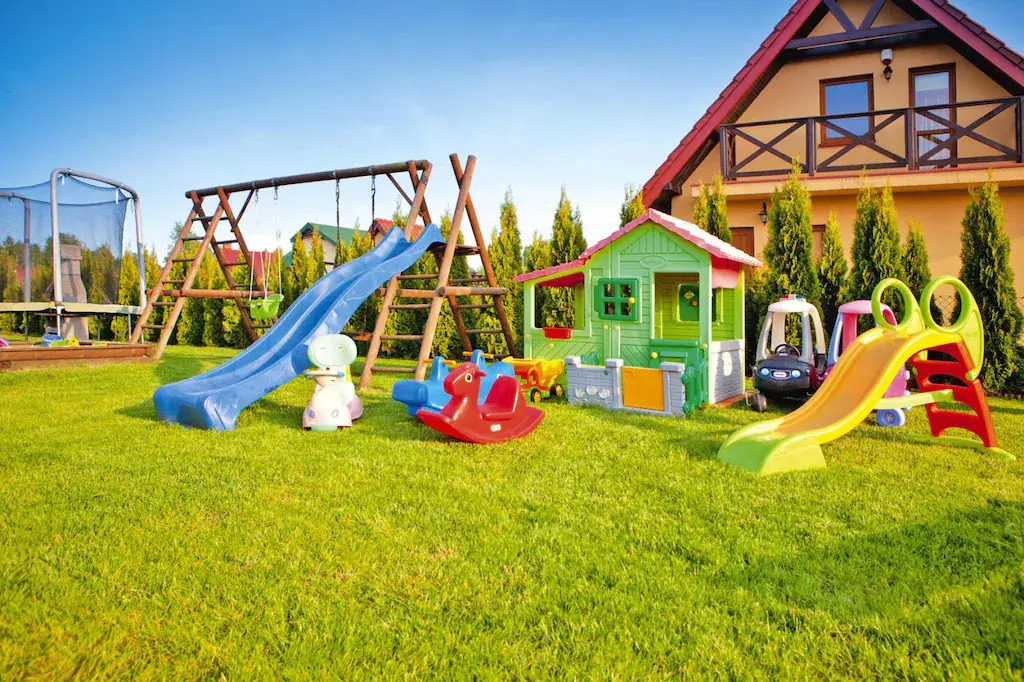Half of holiday home, terrace, playground