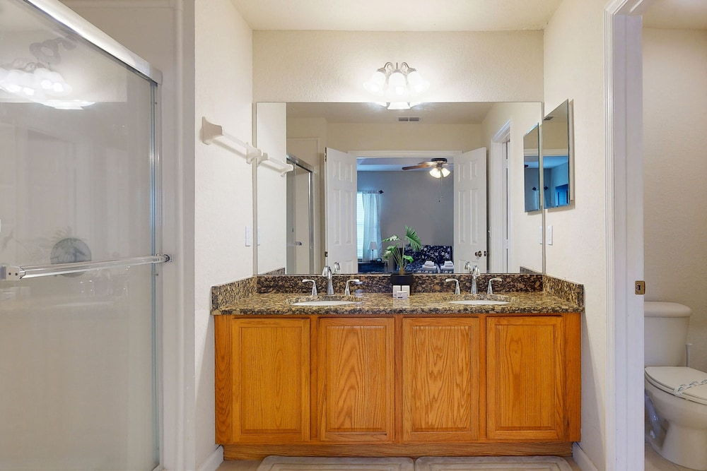 Updated Retreat With Pool Access, W/d, AC, & Patio - Close to Disney Parks