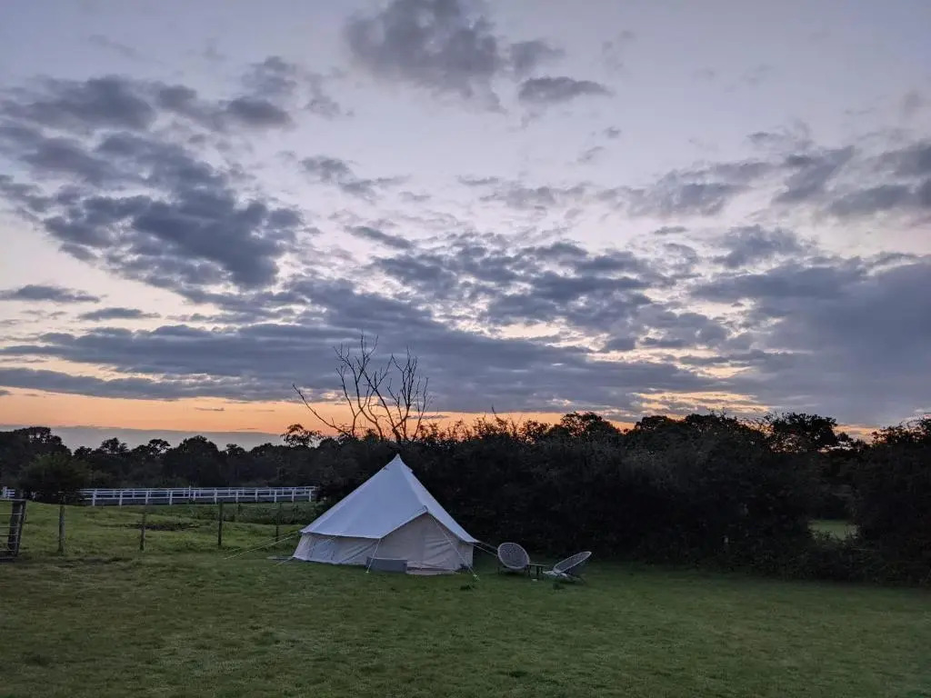 Log cabin retreat and luxury bell tent