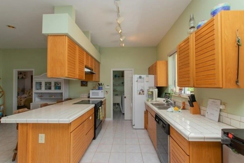 Beautiful House Located In The Prestigious Neighborhood Of Port Antigua On A Deep, Wide Canal. 4 Bedroom Home by RedAwning