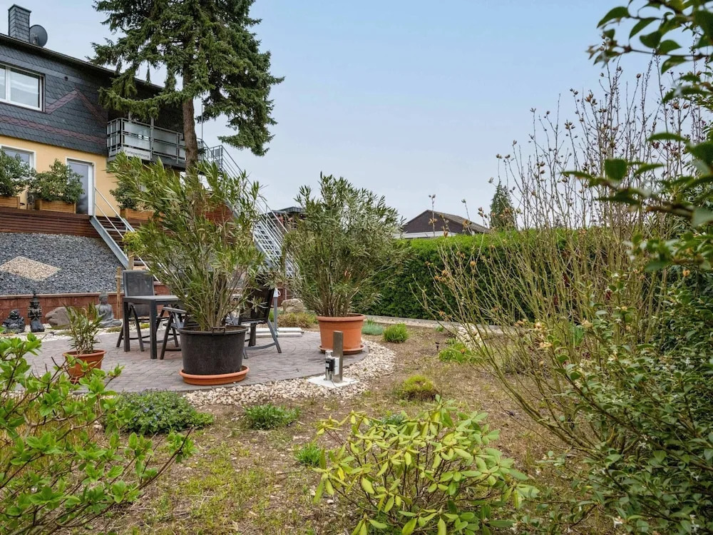 Garden Retreat With Pond View