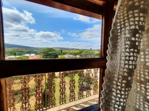 Pousada Luz do Sol, com piscina, quartos amplos e confortáveis no centro de Carrancas