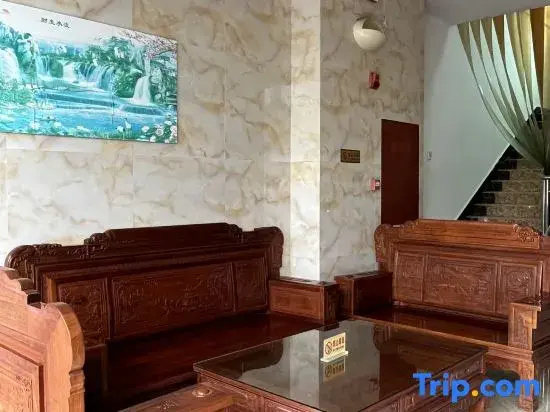 Wanning Jinle Business Hotel