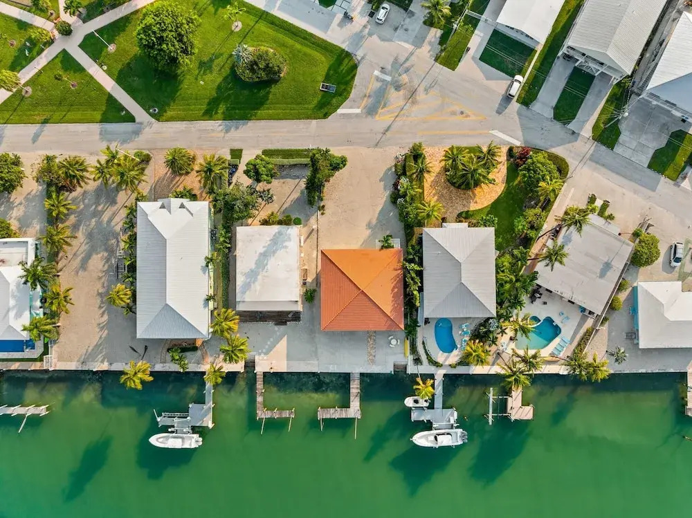 Sunset Harbor Waterfront Villa with Dock Cabana Club