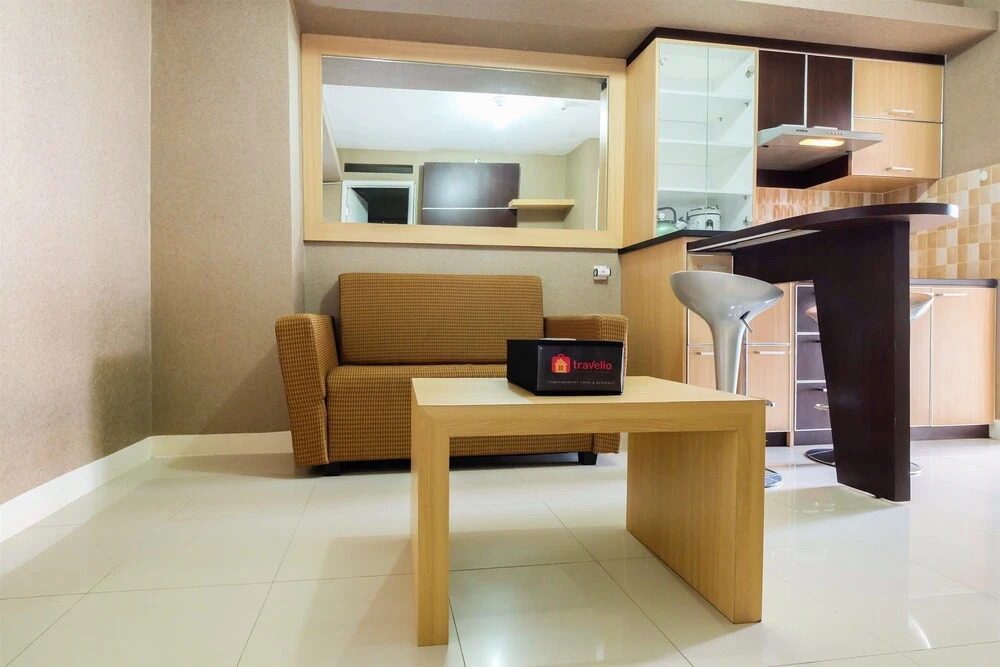 Homely 2 BR Bassura City Apartment By Travelio