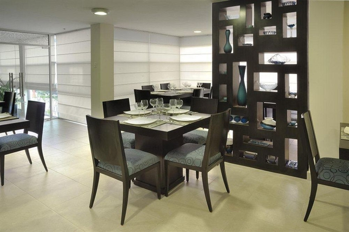 Hotel MC Suites - Confort cerca del Aeropuerto