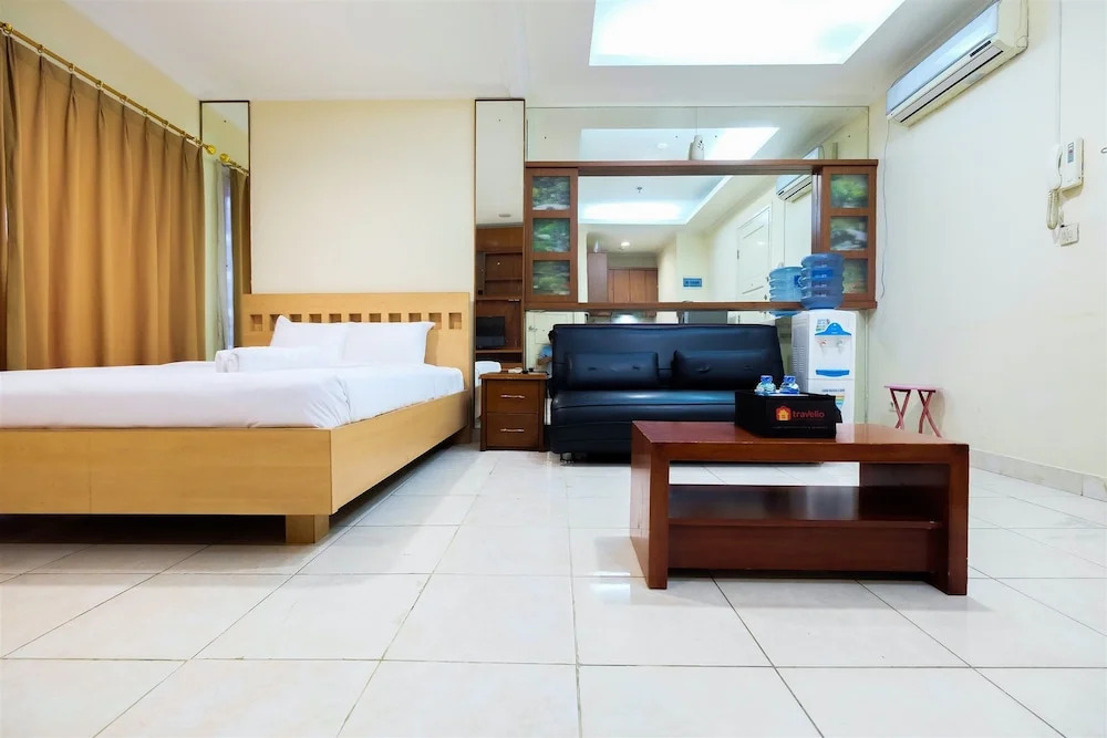 Simply Spacious Studio Room at City Home Apartment near Kelapa Gading