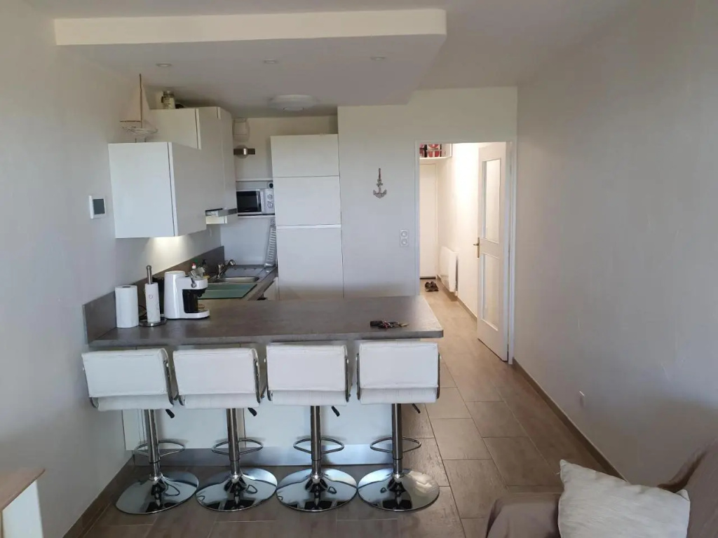 T2 rez de jardin front de mer