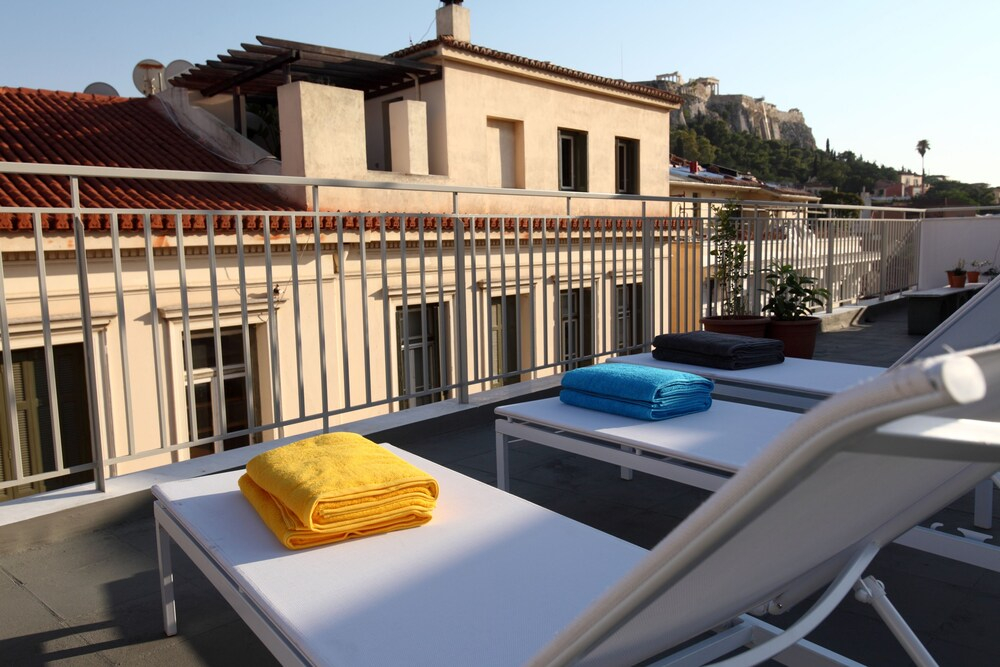 The Marble Suites, PLAKA