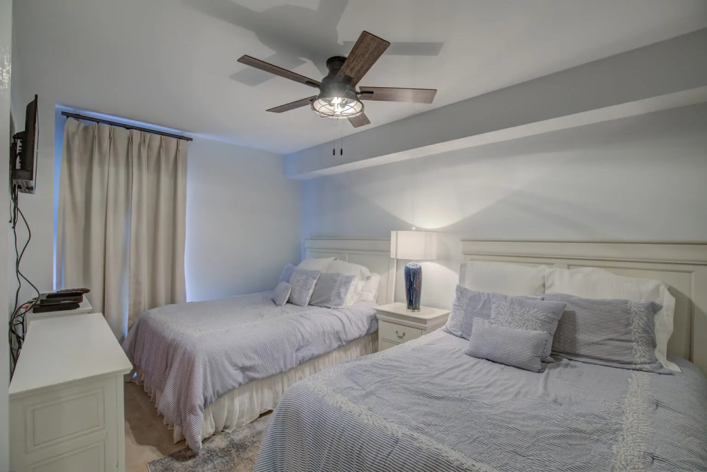 Gorgeous ground floor condo with private balcony steps from pool