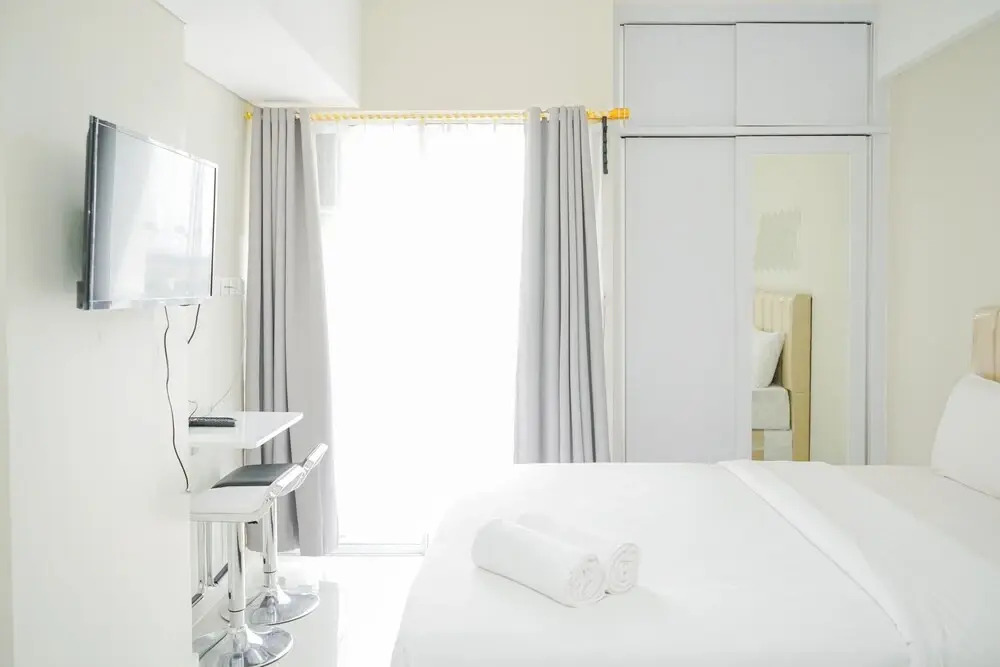 Homey and Minimalist Studio Padina Apartment