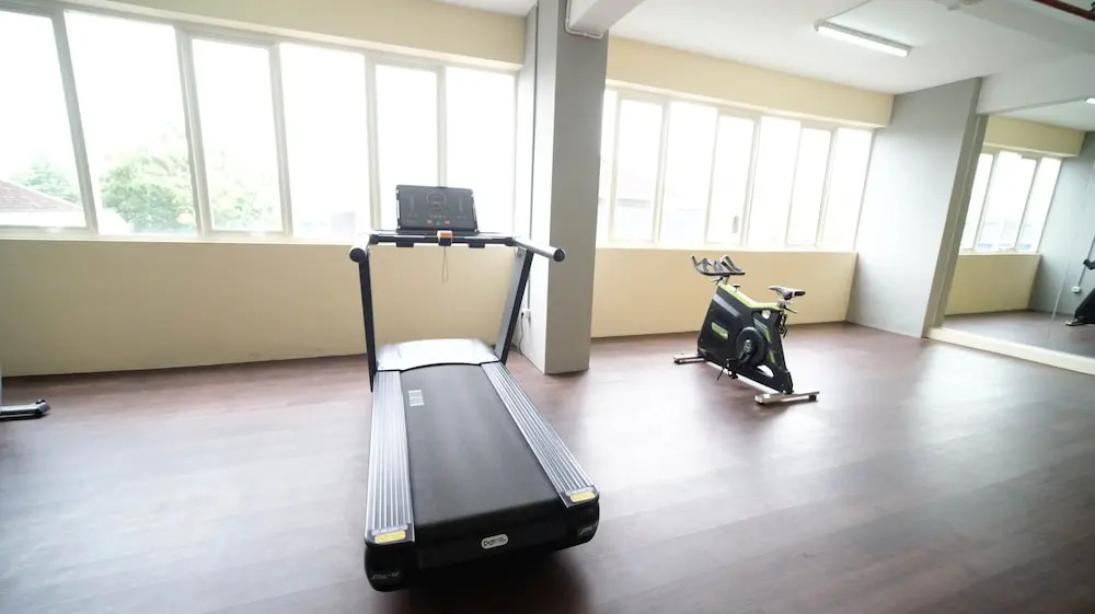 Compact and Tidy Studio at Puncak Dharmahusada Apartment By Travelio