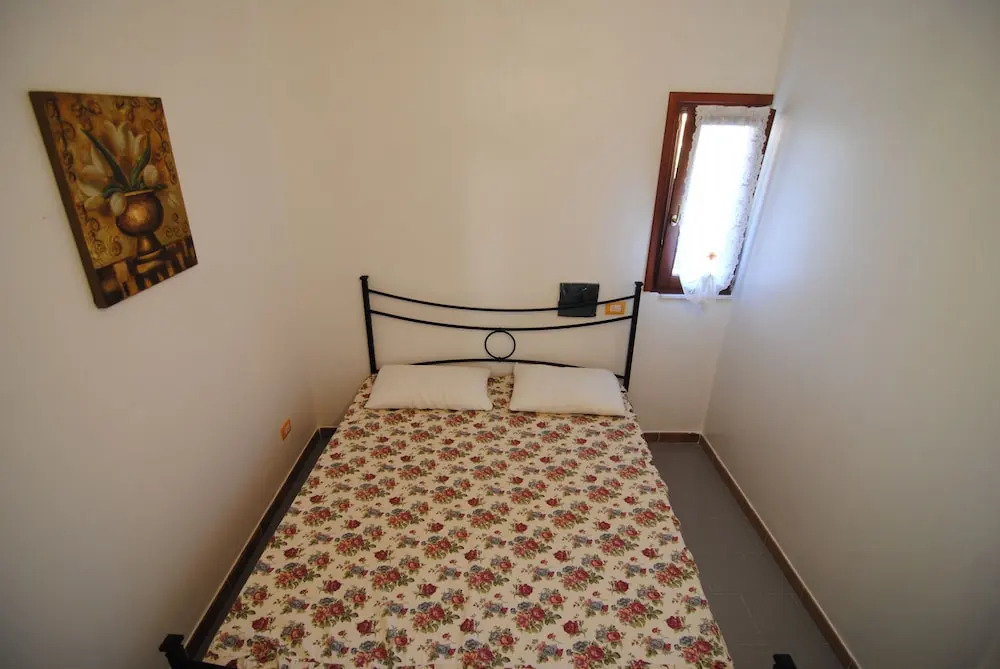 Spiaggia Bianca Pedra Rosa - Your House in Sardinia