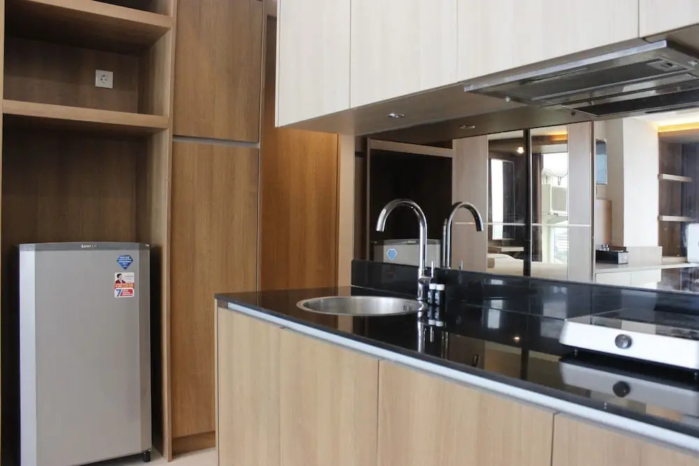 Trendy & Comfy Studio at Tamansari la Grande Apartment