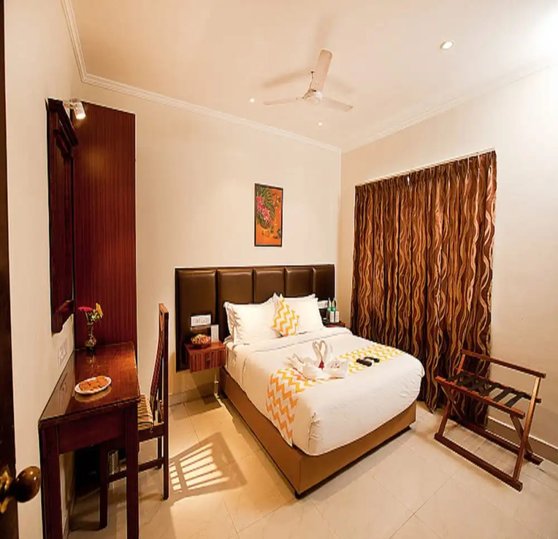 Blossoms Hotel & Service Apartments