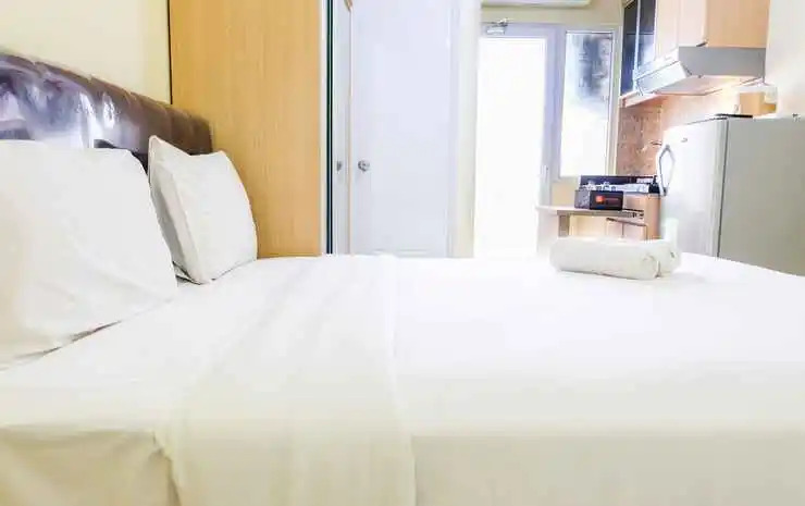 Compact and Cozy Studio Apartment Green Pramuka City By Travelio