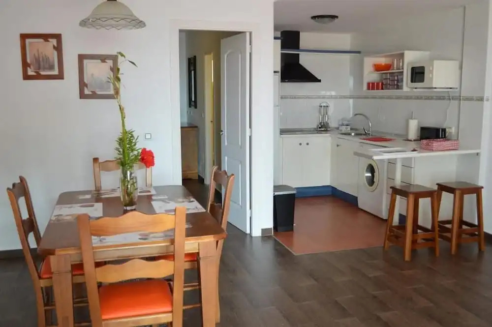 Ground floor apt facing the nudist beach, with private patio & East orientation