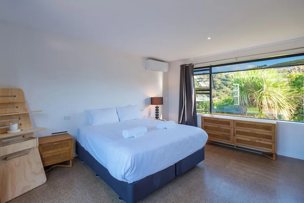 Wharetana Bay Villa with private walkway to beach