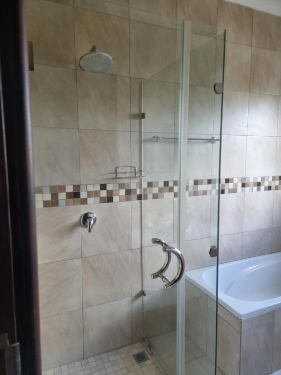 Beautiful 3 bedroom home in a gated complex with private garden and pool