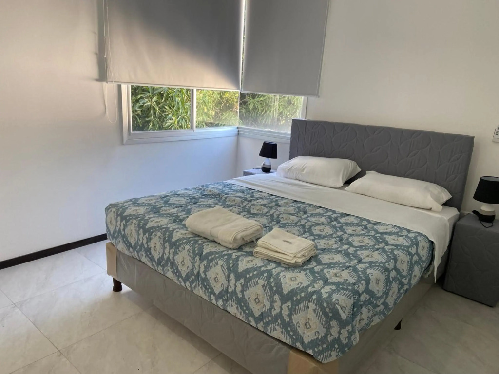 Hermoso departamento con piscina y estacionamiento