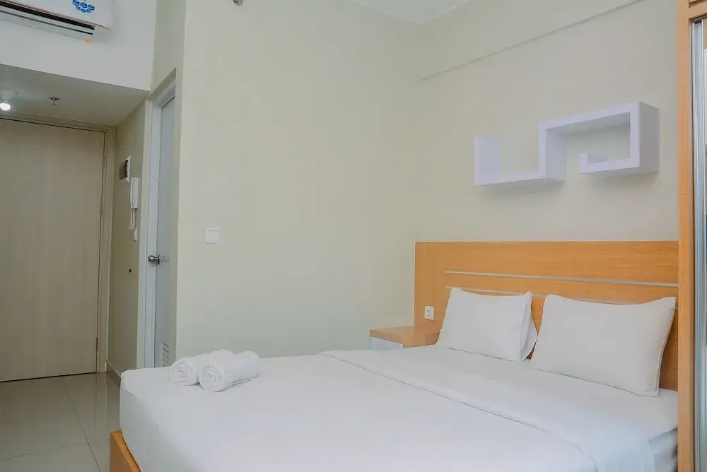 New Furnsihed Studio Room Apartment at Springlake Bekasi By Travelio