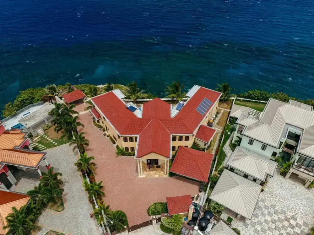 Breathtaking Oceanfront Luxe Villa in Tower Isle Jacuzzi Pool Fully Staffed
