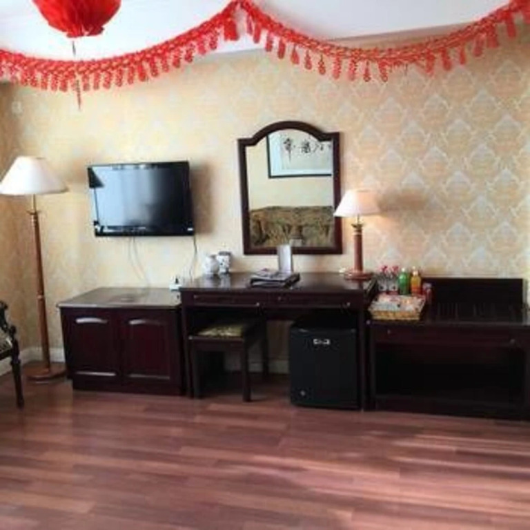 Fushun Tiantian Hotel (Mudanjiang High-speed Railway Wanda Branch)