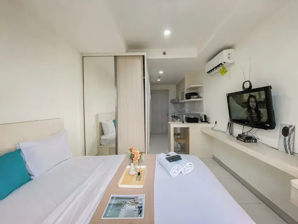 Modern Look and Restful Studio at Azalea Suites Apartment