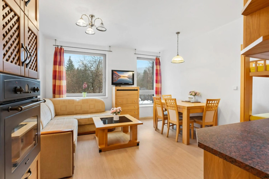 APARTMÁN RESIDENT HARRACHOV C308 Horský apartmán 2KK s velkou terasou a vlastním parkováním v garáži