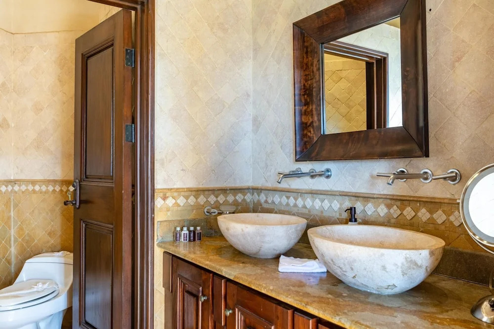 Elegant Mediterranean-Style Mansion with Beachfront Views and Private Infinity Pool