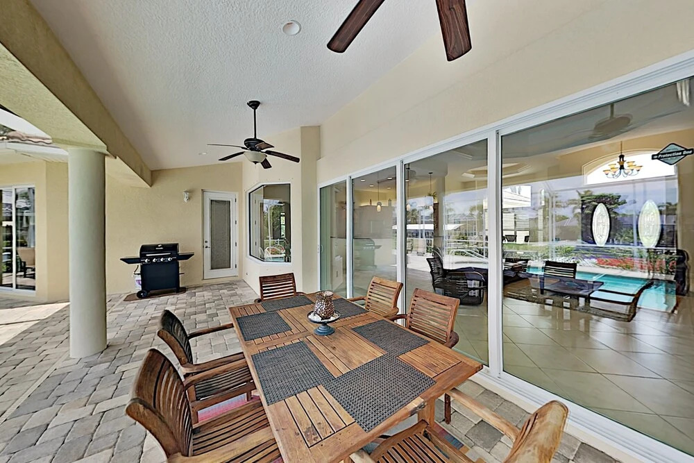 Upscale All-suite Canal W/ Dock & Fireplace 4 Bedroom Home