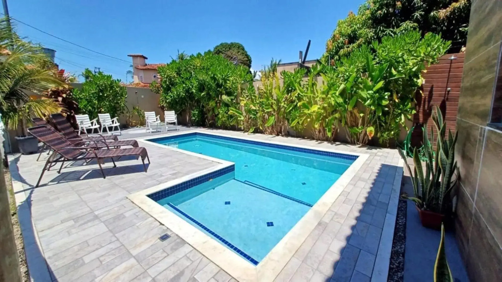 Casa de 4 suítes com piscina e área gourmet em Porto Seguro - Casa dos Ipês