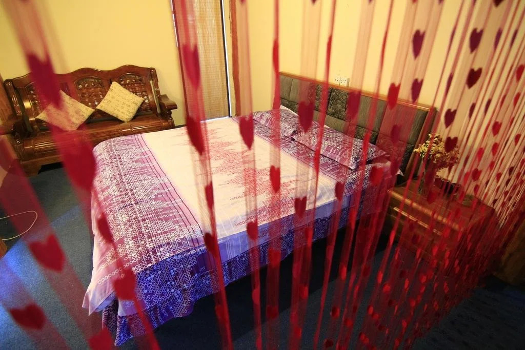Lijiang Shuhe Shi Wu Wan Hostel
