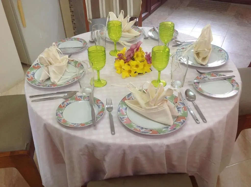 Cardamon Villa is a 2 bedroom with 1 bathroom and seperate toilet detached house with AC and swimming pool , 5 minutes walk from Flic en Flac public beach
