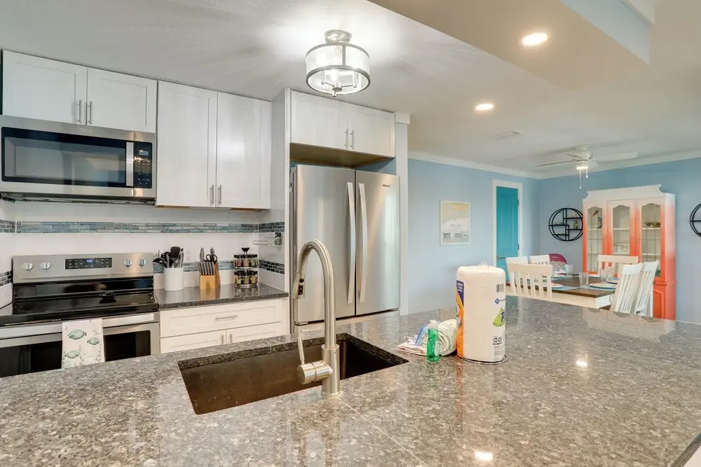 Sip, Sunbathe & Relax Poolside: Madeira Beach Gem!