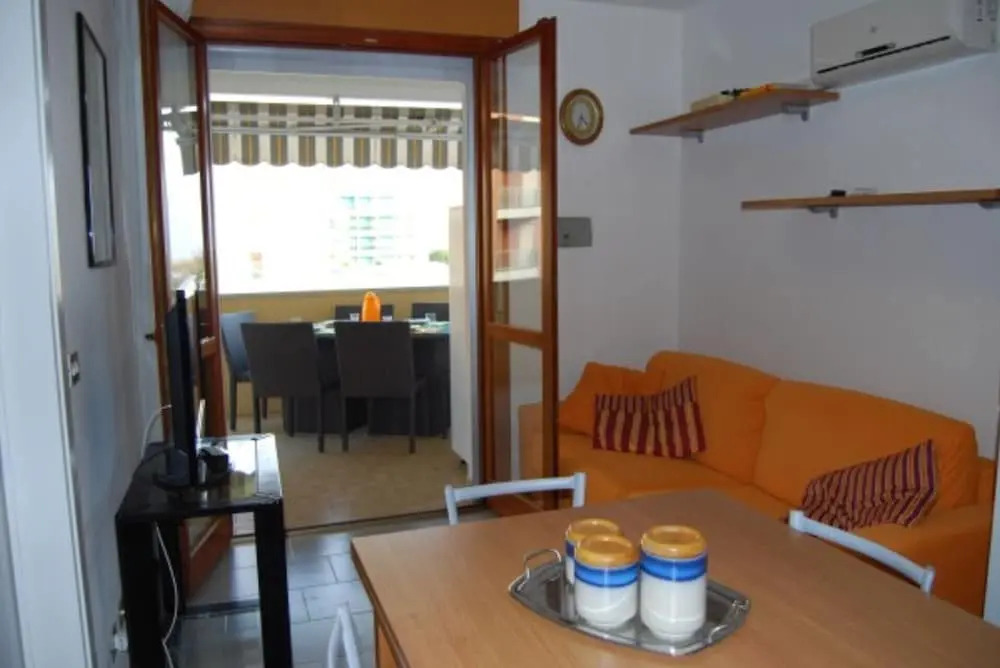 Enjoy the Beach Breeze in our Colorful Flat