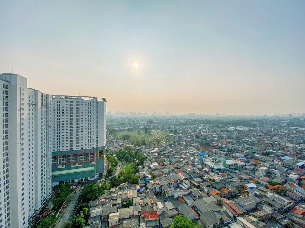2BR with Cozy Style at Bassura City Apartment By Travelio