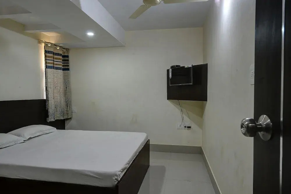 SPOT ON 37153 Karavali Paradise
